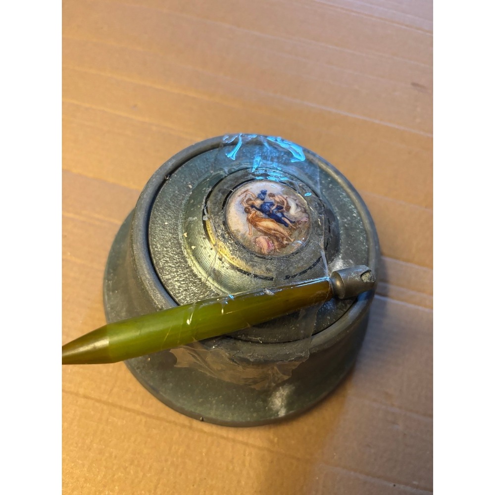 This vintage Victorian powder/music box is a rare and charming collectible piece